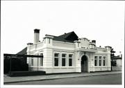 Angled front elevation of building