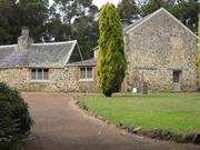 Two storey main residence and single storey associated buildings