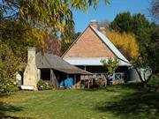 Timber house and brick house