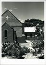 Front view of church showing exterior of transept