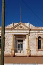 Front elevation - detail of central balcony