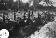 Workers in the diversion channel