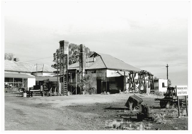 Oblique view of Assay Office in setting