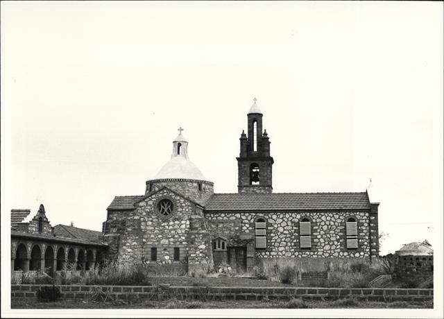 Rear elevation of church from East showing part of priest's house on left