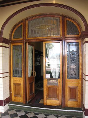 Front entrance with stained glass