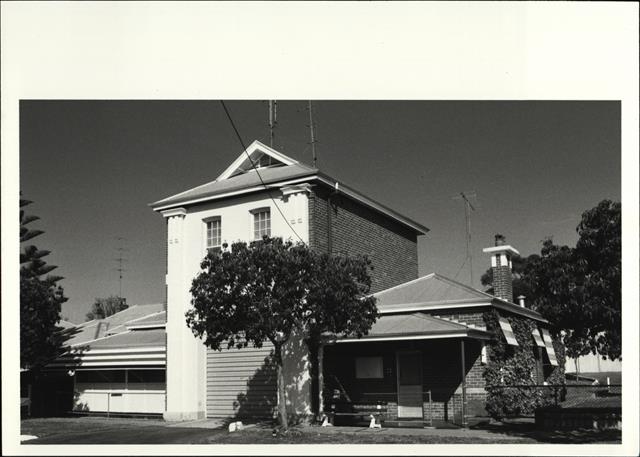 Angled front elevation of station and quarters