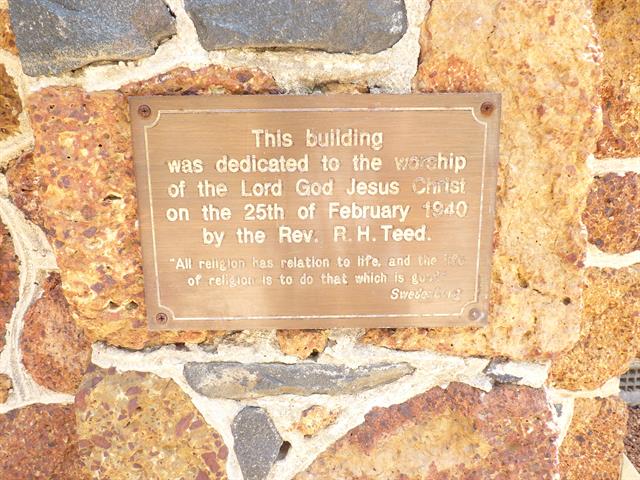 Plaque, right of entrance