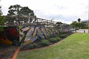 Context view to SW corner Skate Park, commercial building