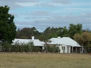 View from the railway reserve showing part of the NE and NW facades