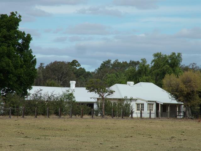 View from the railway reserve showing part of the NE and NW facades