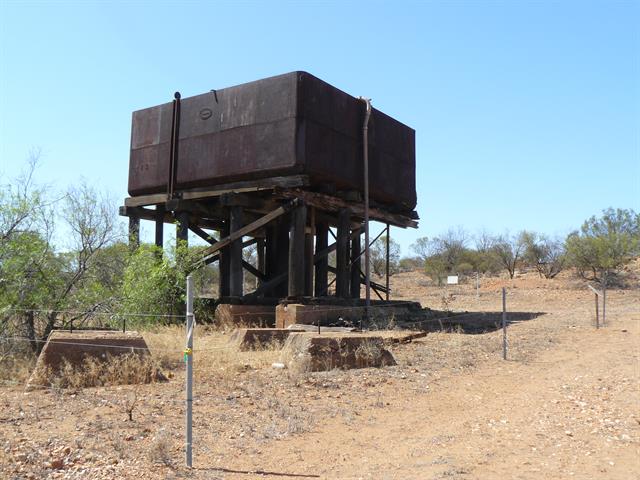 Water Tank propped to northwest corner