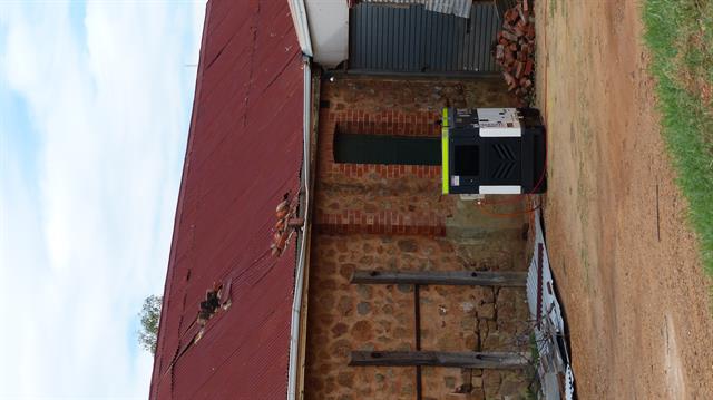 Rear view - Damage to roof sheeting